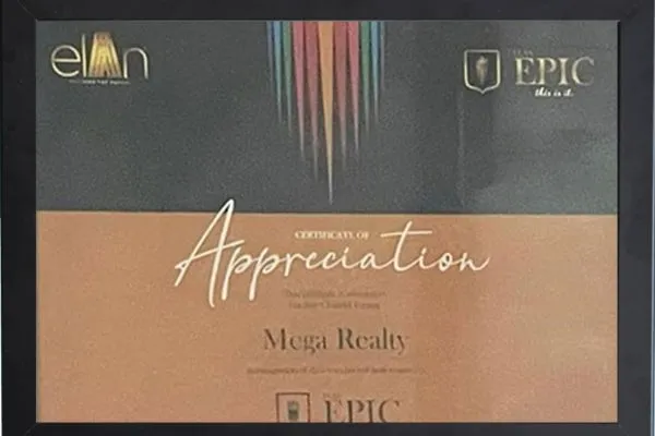 A framed Certificate of Appreciation from Elan (This Is Your Future) for their Epic project, awarded to Mega Realty with copper/bronze and dark themed design, featuring colorful vertical lines at the top and the Elan Epic logo.