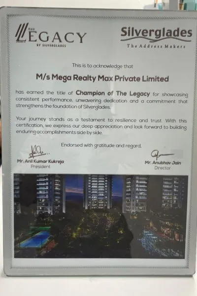 A framed certificate from Silverglades (The Legacy) acknowledging M/s Mega Realty Max Private Limited as 