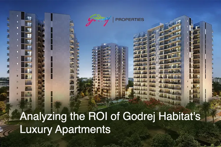 Exterior view of three modern, high-rise luxury apartment buildings at Godrej Habitat, surrounded by green landscaping and trees under a twilight sky.