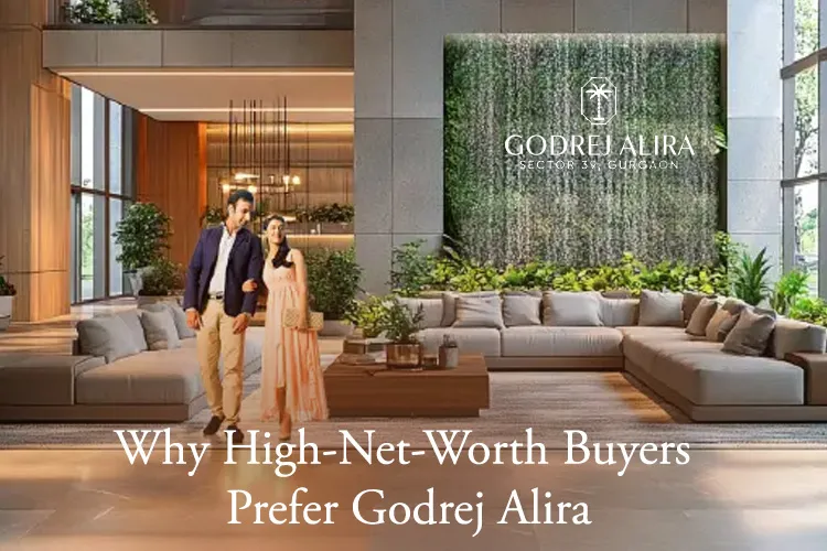 Elegant lobby interior of Godrej Alira Sector 39 Gurgaon with a couple walking through a luxurious living space featuring a green wall and premium furnishings.