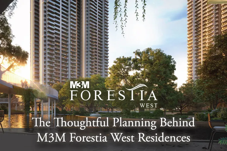 High-rise towers of M3M Forestia West surrounded by lush greenery and water features, showcasing thoughtful residential planning.