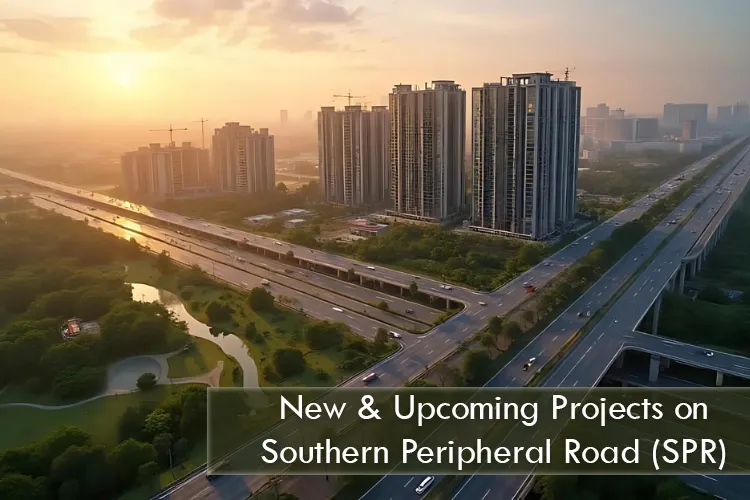 An aerial view of the Southern Peripheral Road (SPR) in Gurugram at sunset, showing a wide, multi-lane highway with several large, modern high-rise apartment buildings and construction cranes lining both sides of the road.