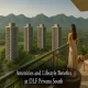 Woman enjoying balcony view of DLF Privana South high-rise residences with greenery and hills in the background.