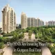 Luxury high-rise residential towers surrounded by lush greenery in Gurgaon real estate.