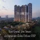 Luxury residential towers at Signature Global Deluxe DXP surrounded by greenery and cityscape at dusk.