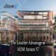 M3M Atrium 57 premium retail and commercial complex featuring a food court, brands like Zara, Levi's, Dior, Nike, and a modern facade, located in Gurugram. The text over this image is "The Location Advantage of M3M Atrium 57"