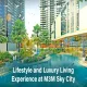 Modern high-rise residential complex at M3M Sky City featuring landscaped gardens, palm trees, vibrant flower beds, and a large swimming pool, showcasing premium lifestyle and luxury living.