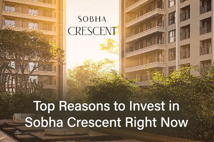 Sobha Crescent luxury residential towers surrounded by lush greenery at golden hour.