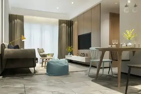 Central Park 104 – Contemporary Comfort in Gurugram’s Elegant Residences Modern living and dining area at Central Park 104 Gurugram featuring beige sofa, blue bean bag, wooden dining table, pendant lights, and natural daylight