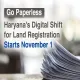 Stack of papers with text reading "Go Paperless: Haryana's Digital Shift for Land Registration Starts November 1"