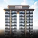 Twin high-rise towers of AIPL Riviera at Lake City connected by a modern skybridge, showcasing sleek glass architecture