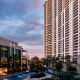 Luxury high-rise apartments with landscaped pool and clubhouse at DLF Arbour Senior Living