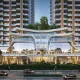 Exterior front view of Origen Realty The Oryza featuring a multi-story glass clubhouse with futuristic curved architecture set against luxury residential high-rise towers.