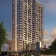 Modern high-rise residential tower at SmartWorld Nature Court, GIC Manesar, during sunset