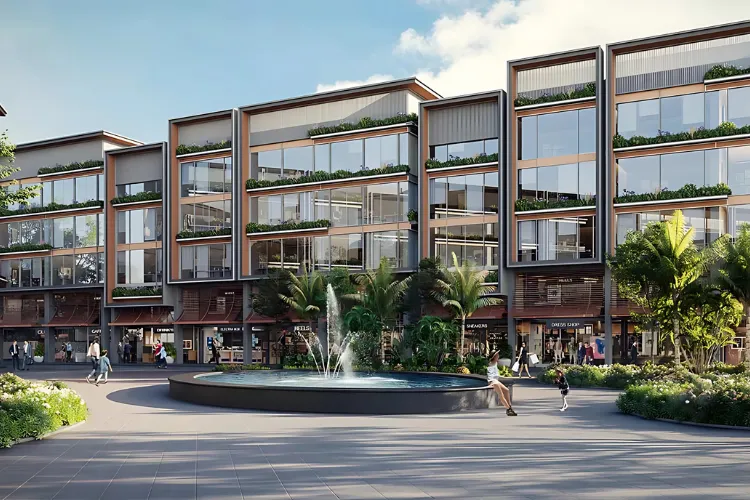 Signature Global City of Colours residential project in Gurugram featuring modern architecture, landscaped plaza, water fountain, and vibrant community spaces.